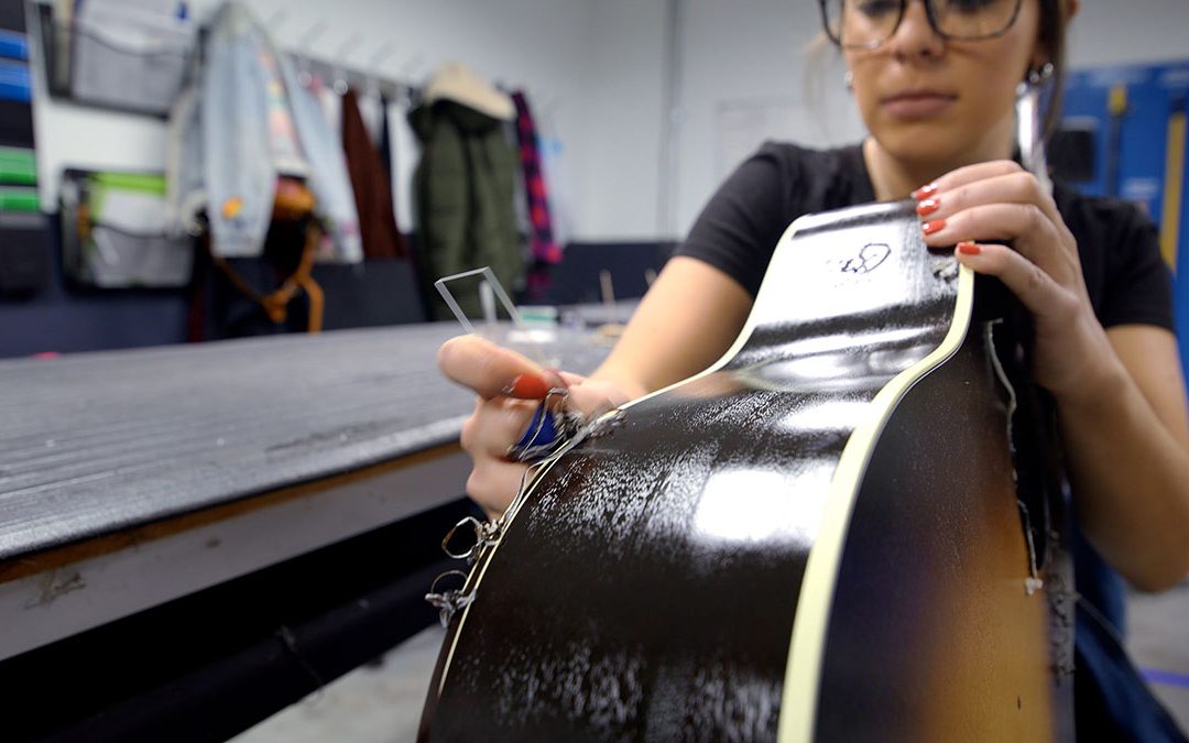 Video: binding scraping on Gibson acoustic guitars