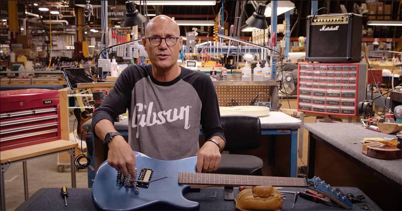 Jim DeCola setting up a Kramer guitar with a Floyd Rose system