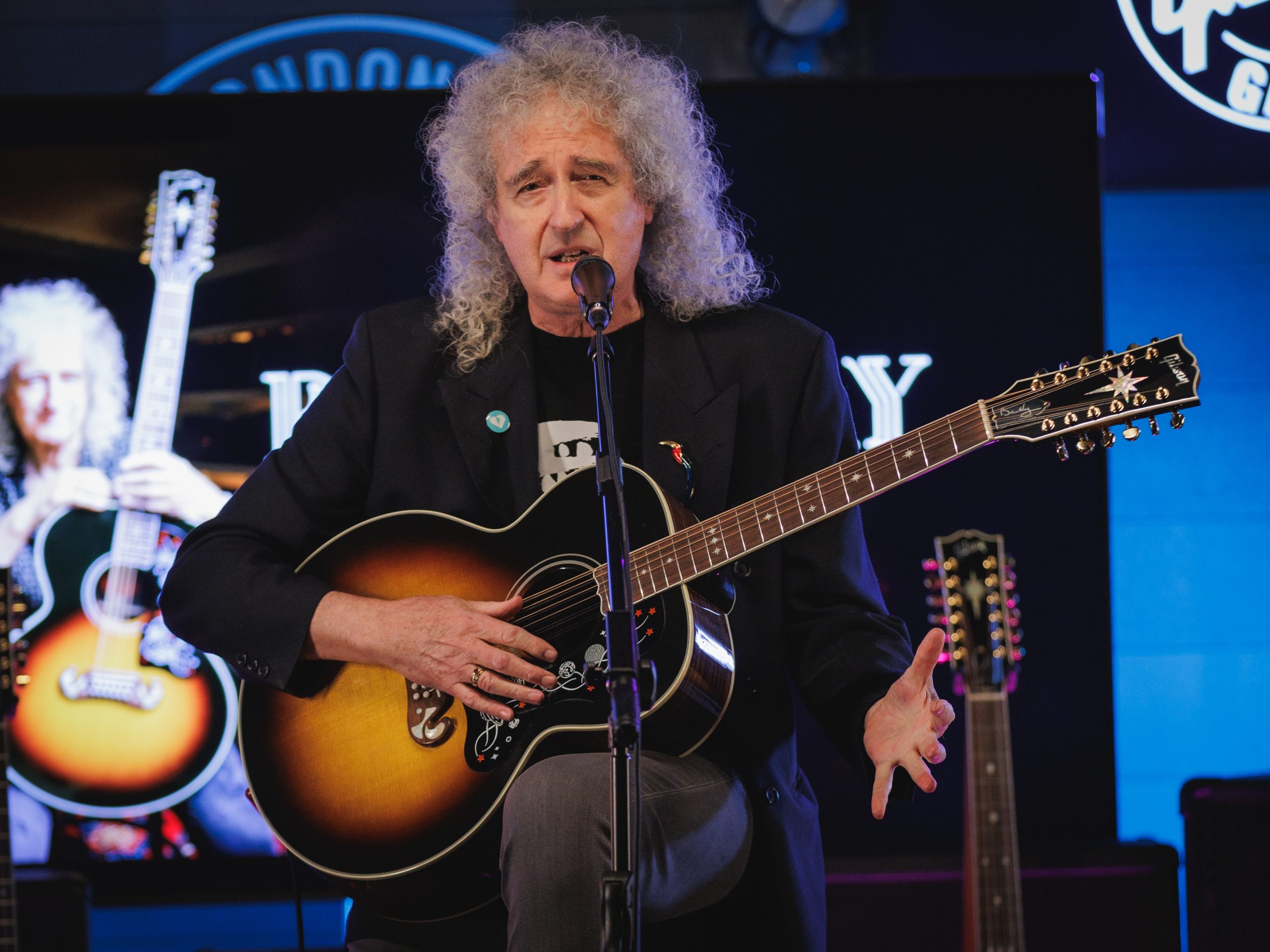 Brian May appearing at the launch of his signature 12-string at Gibson Garage London